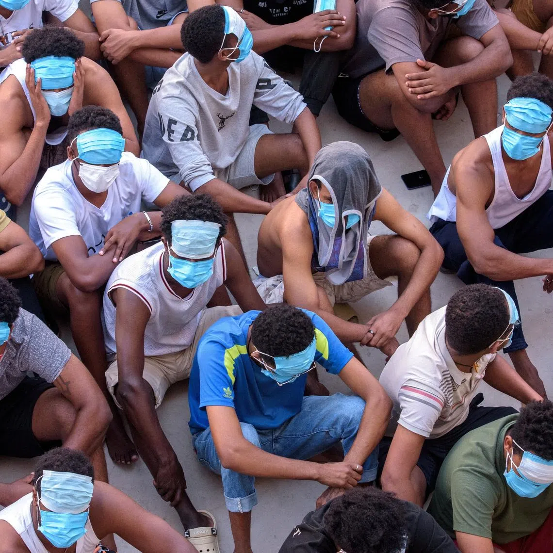 Victims of scam centres who were tricked or trafficked into working in Myanmar at a fraud factory after a multinational crackdown in Myawaddy, Myanmar, in February 2025.