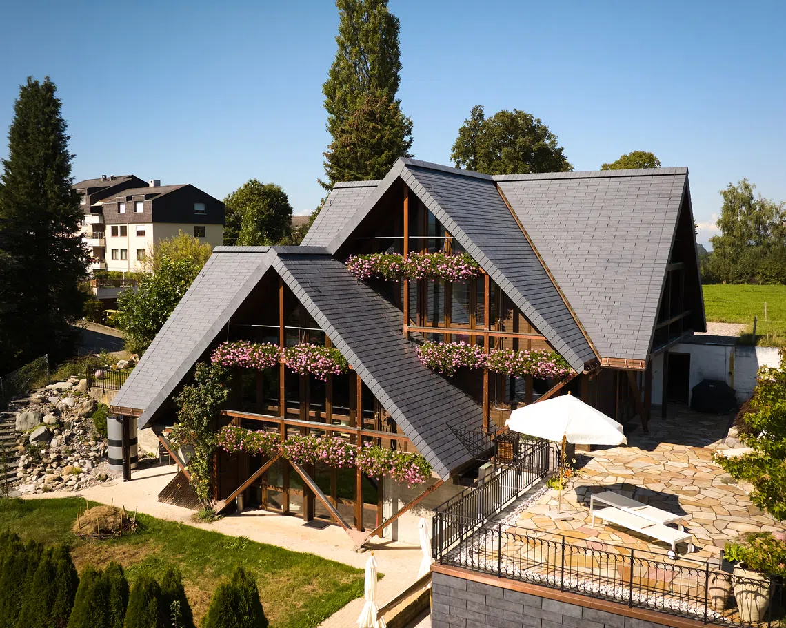 Clay-like solar roofs installed on a building in Switzerland.