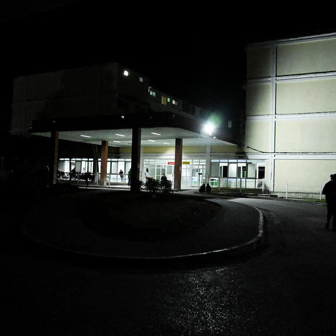 People approach the entrance of the Provincial Clinical–Surgical Hospital \"Arnaldo Milian Castro,\" where, according to local information, injured people were being treated after an armed incident involving a Florida-registered speedboat and a Cuban patrol, at a time of heightened tensions with the United States, in Santa Clara, Cuba, February 25, 2026. REUTERS/Norlys Perez