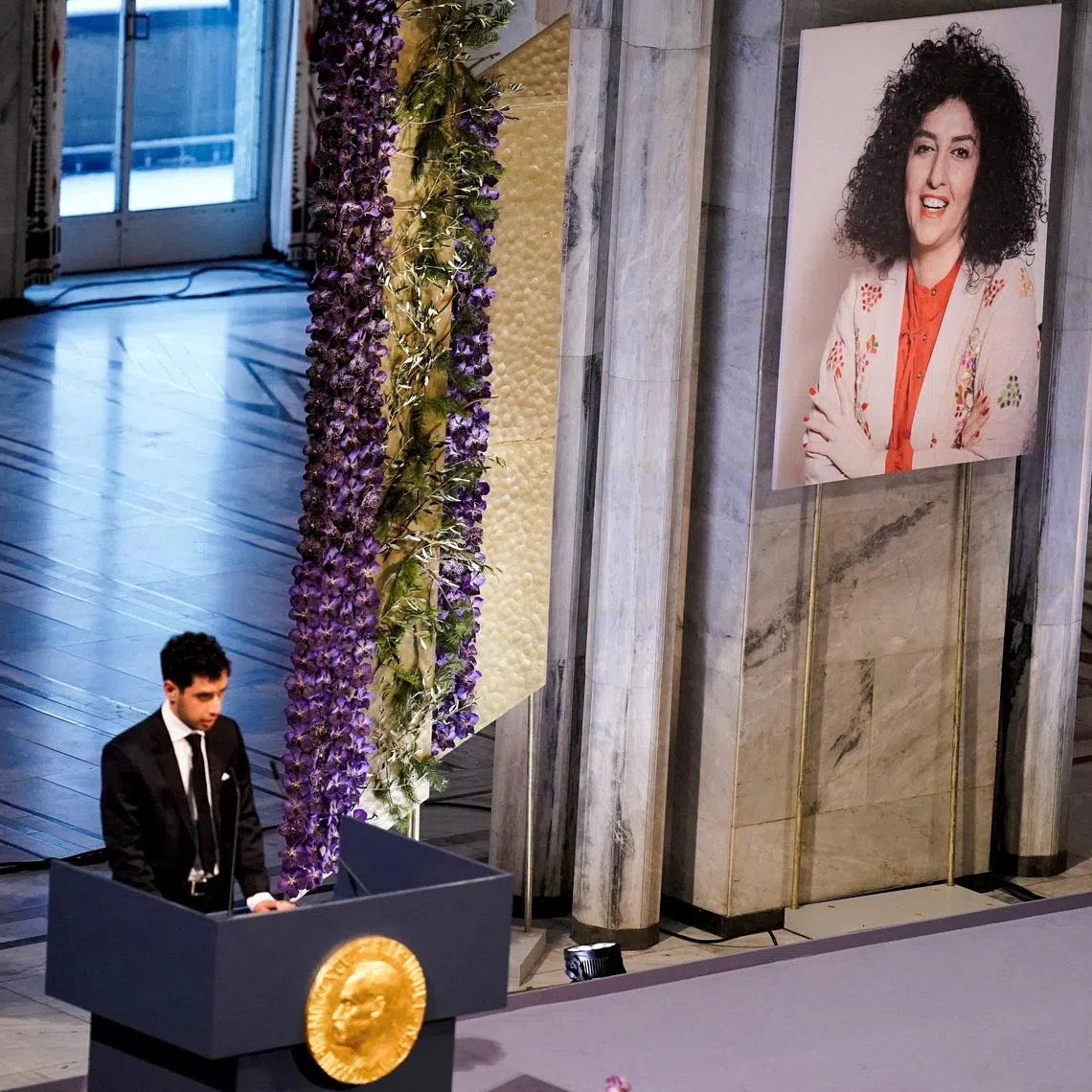 FILE PHOTO: Ali Rahmani, son of Narges Mohammadi, an imprisoned Iranian human rights activist, who was awarded the Nobel Peace Prize 2023, speaks after receiving the award on behalf of his mother at Oslo City Hall, Norway December 10, 2023. NTB/Fredrik Varfjell via REUTERS /File Photo