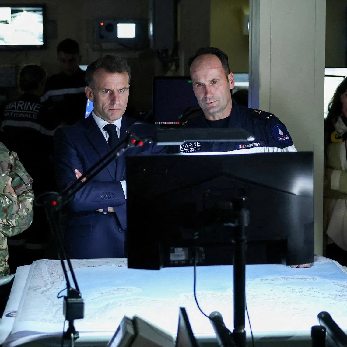 French President Emmanuel Macron visits the bridge of the French aircraft carrier Charles de Gaulle, on the day of his visit to Cyprus, showing France's solidarity after recent drone attacks amid the U.S.-Israeli conflict with Iran, and aimed at reinforcing European security in the Eastern Mediterranean, on the Mediterranean Sea. REUTERS/Gonzalo Fuentes/Pool