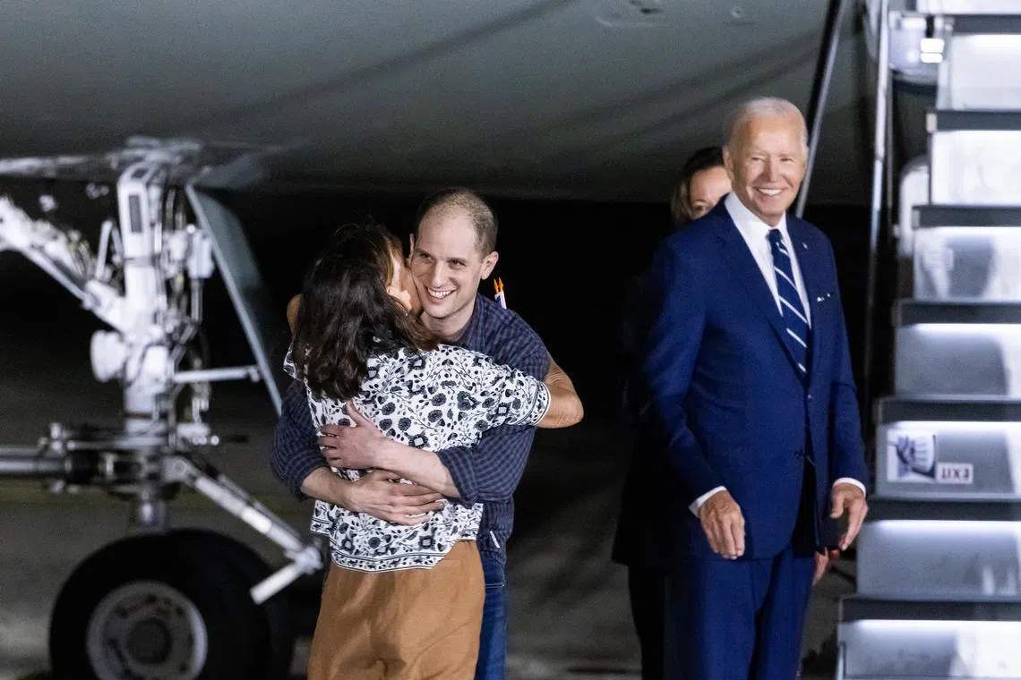 Wall Street Journal reporter Evan Gershkovich hugs his mother after arriving in the US on Aug 1 as part of a 26-person prisoner swap between Russia, the US, and five other countries.