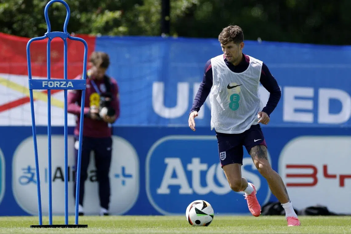 FILE PHOTO: Soccer Football - Euro 2024 - England Training - Blankenhain, Germany - June 13, 2024 England's John Stones during training REUTERS/John Sibley/File Photo