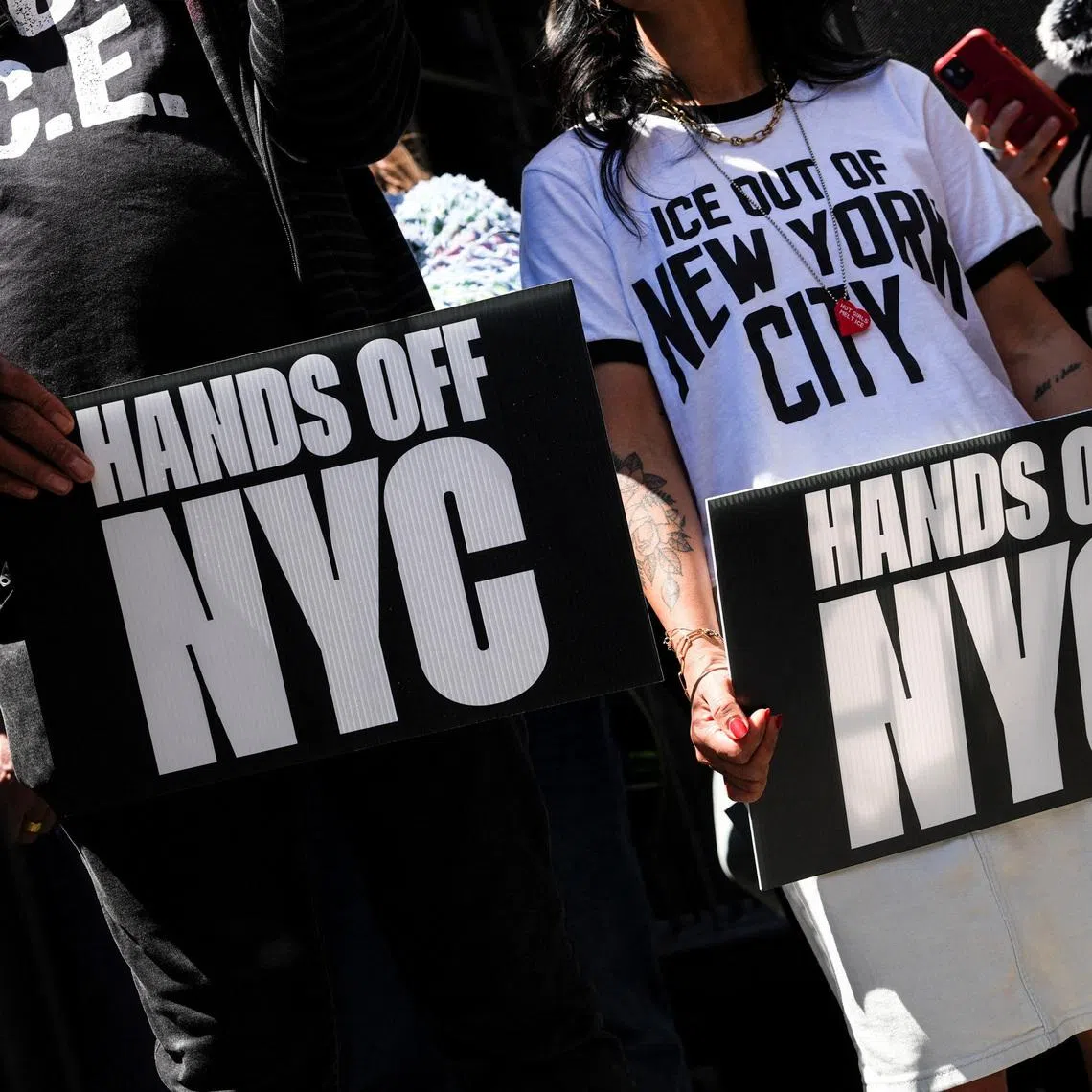 Demonstrators holding signs during an anti-ICE protest in front of 26 Federal Plaza Immigration Court in the Manhattan borough of New York City on May 12. 