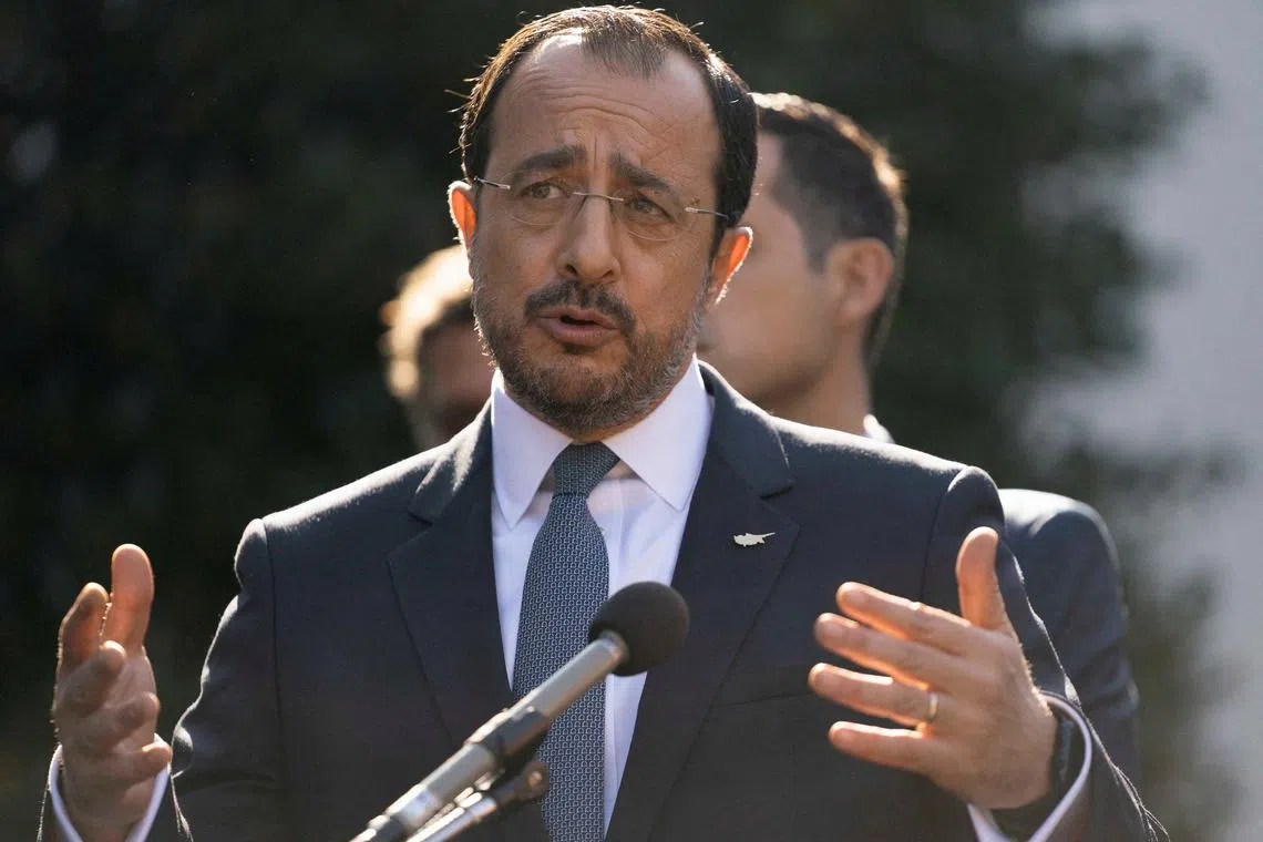 FILE PHOTO: Cyprus' President Nikos Christodoulides speaks with members of the media outside the White House, following an Oval Office meeting with U.S. President Joe Biden, in Washington, U.S., October 30, 2024. REUTERS/Nathan Howard/File Photo