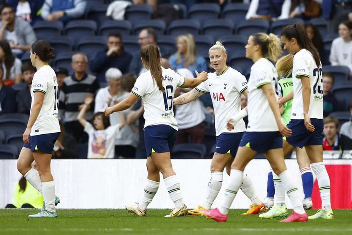 FILE PHOTO: Soccer Football - Women's Super League - Tottenham Hotspur v Reading - Tottenham Hotspur Stadium, London, Britain - May 20, 2023 Tottenham Hotspur's Bethany England celebrates scoring their third goal with Kit Graham and teammates Action Images via Reuters/Peter Cziborra/File Photo