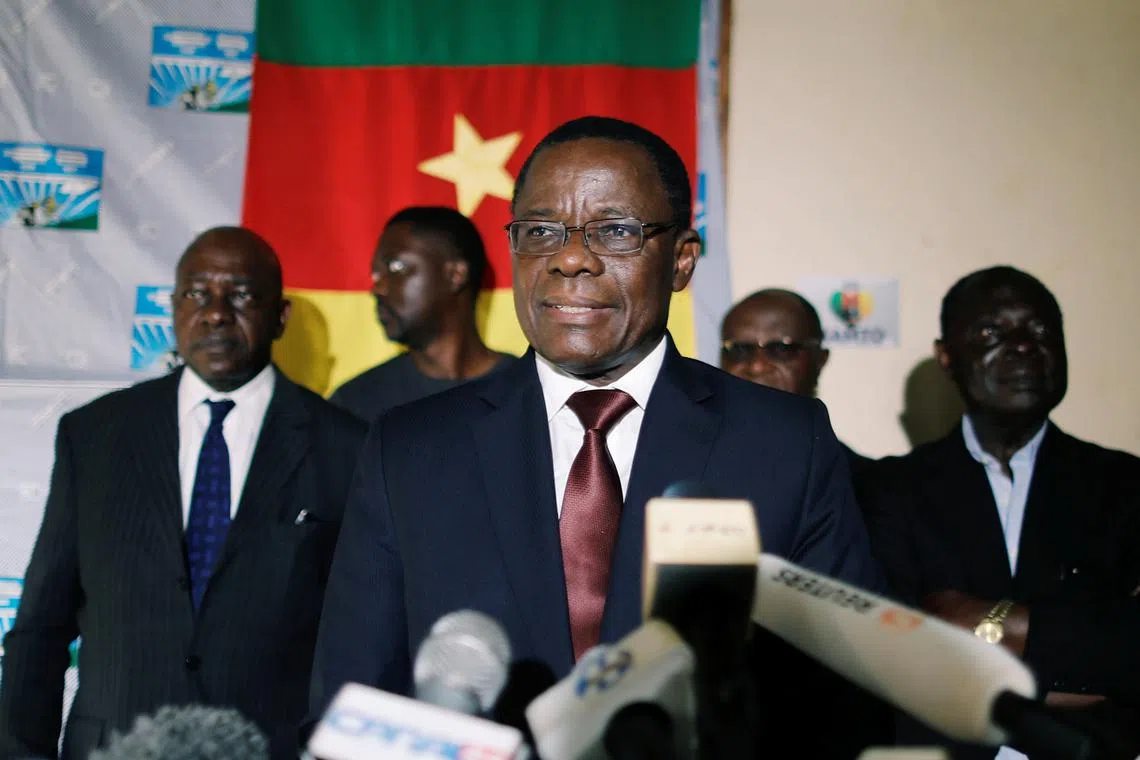 Maurice Kamto, a presidential candidate of Renaissance Movement (MRC), reacts as he holds a news conference at his headquarter in Yaounde, Cameroon October 8, 2018. REUTERS/Zohra Bensemra/File Photo