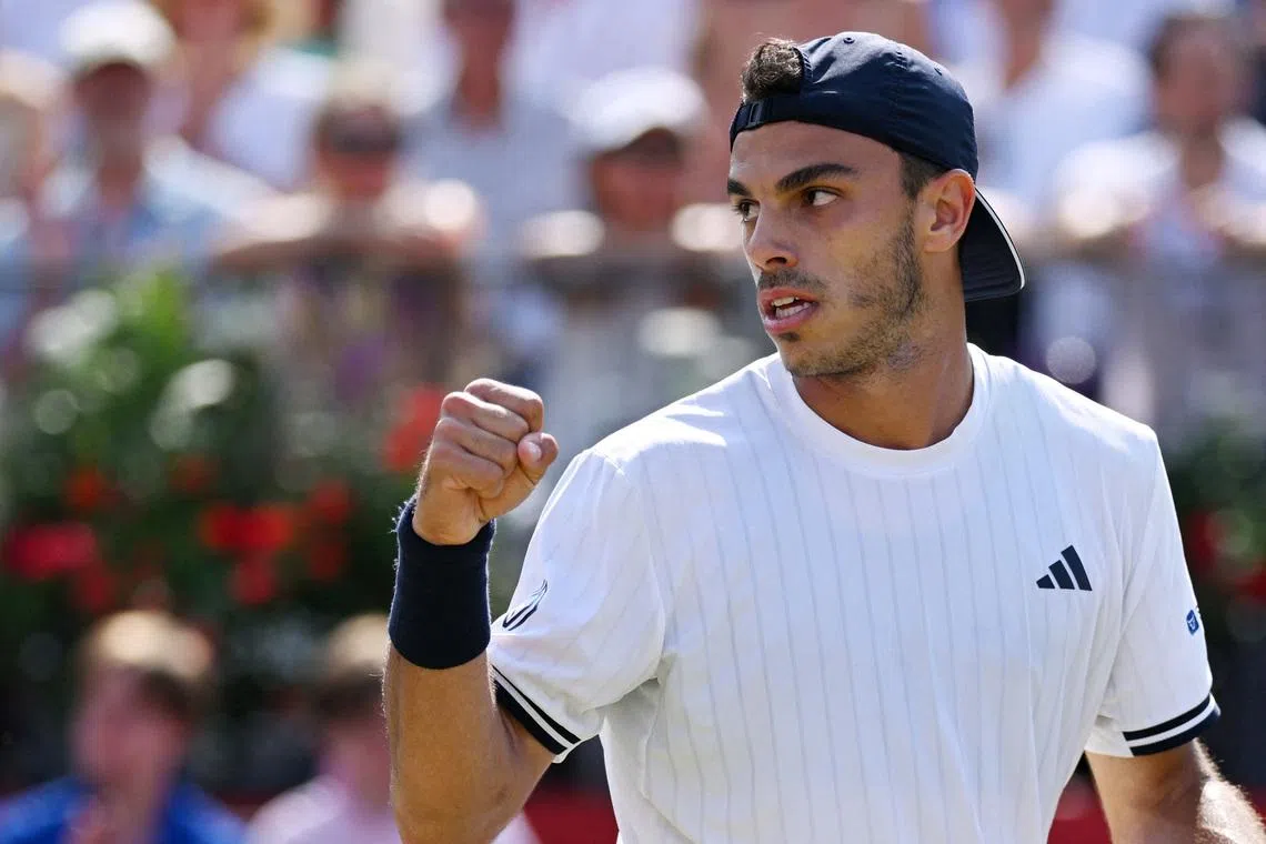 Tennis - Queen's Club Championships - Queen's Club, London, Britain - June 21, 2026 Argentina's Francisco Cerundolo reacts during his final match against Tommy Paul of the U.S. REUTERS/Jaimi Joy