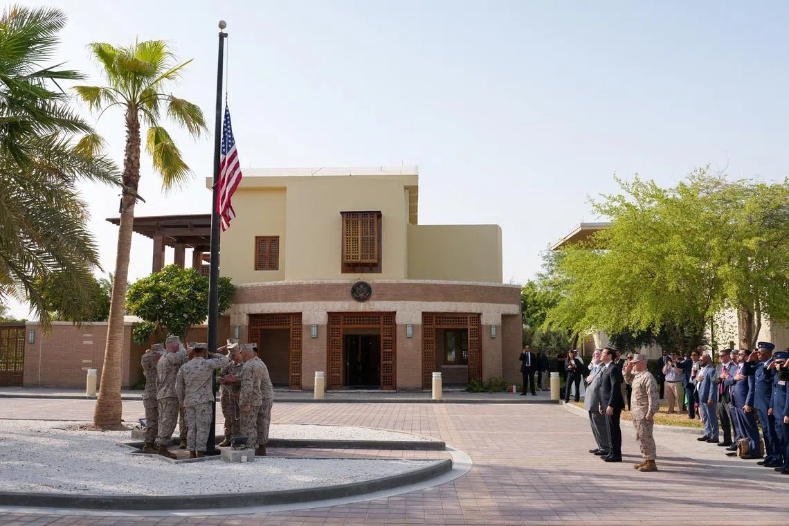 U.S. Secretary of State Marco Rubio and Steven Butler, charge d'affaires ad interim of the U.S. embassy in Kuwait, attend a flag raising ceremony at the U.S. embassy during Rubio's visit to the Middle East to discuss the interim deal between the U.S. and Iran with Arab Gulf allies, in Kuwait City, Kuwait, June 24, 2026. REUTERS/Eric Lee/Pool