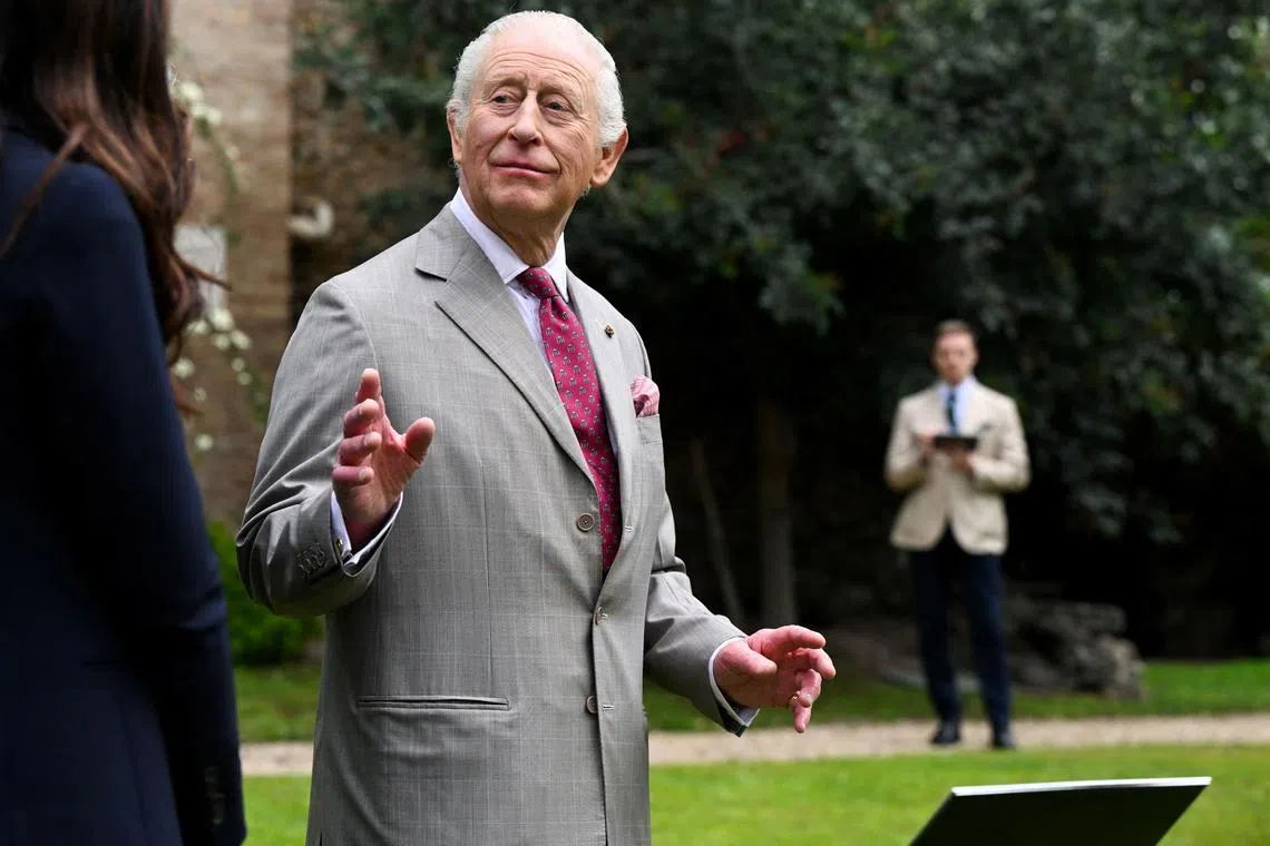 FILE PHOTO: Royal tour artist Fraser Scarfe observes and illustrates King Charles III in the gardens of Villa Wolkonsky, in Rome, Italy, April 10, 2025. Victoria Jones/Pool via REUTERS
