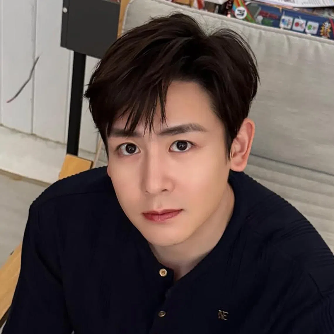 2PM's Nichkhun said he was escorted in a police car home so that the stalker would not follow him.