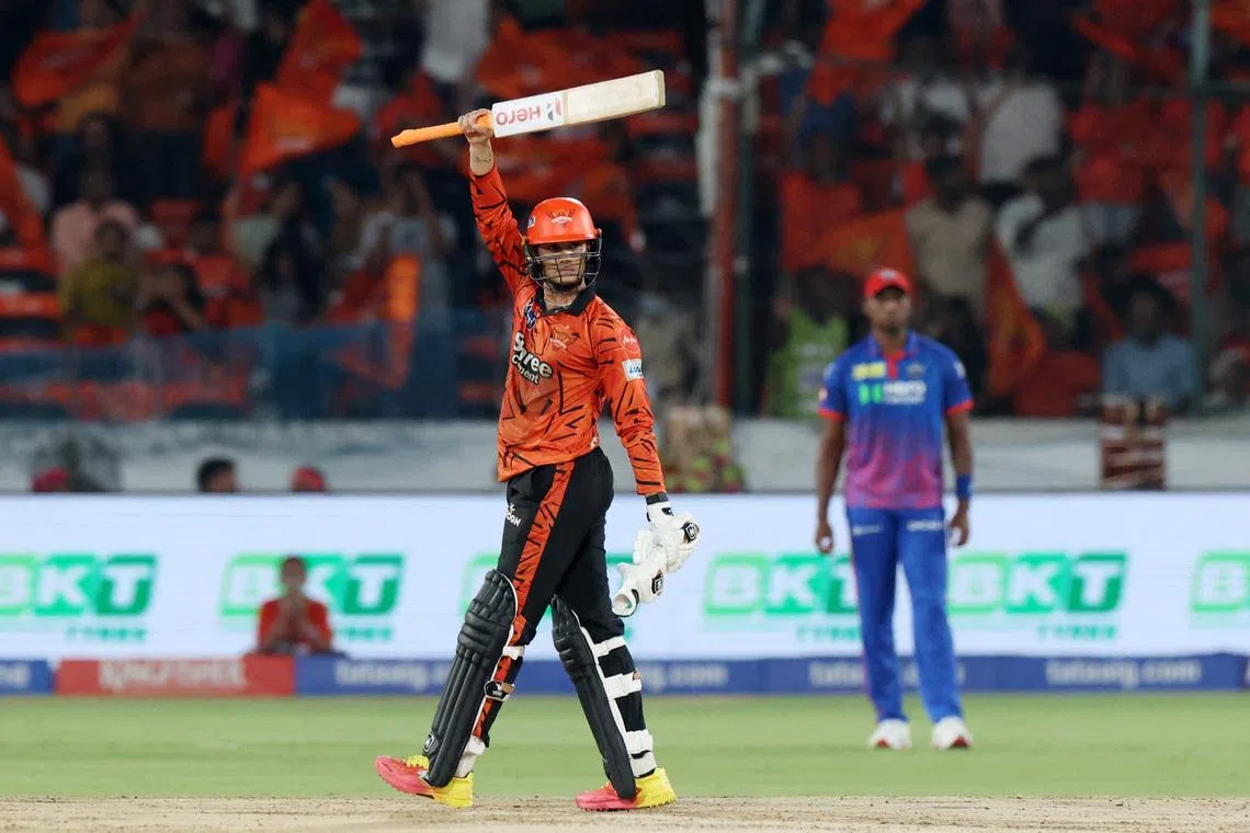 Cricket - Indian Premier League - IPL - Sunrisers Hyderabad v Delhi Capitals - Rajiv Gandhi International Cricket Stadium, Hyderabad, India - April 21, 2026 Sunrisers Hyderabad's Abhishek Sharma celebrates after reaching his century REUTERS/Priyanshu Singh