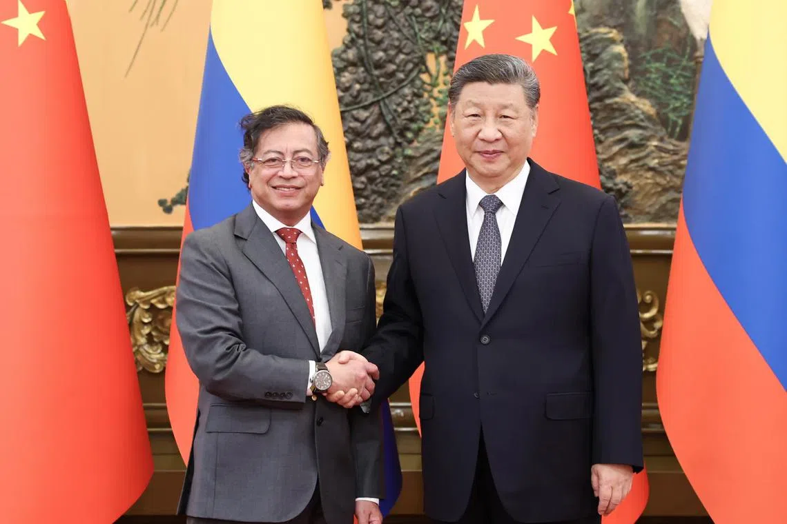 Chinese President Xi Jinping (right) meets with Colombian President Gustavo Petro at the Great Hall of the People in Beijing, China.