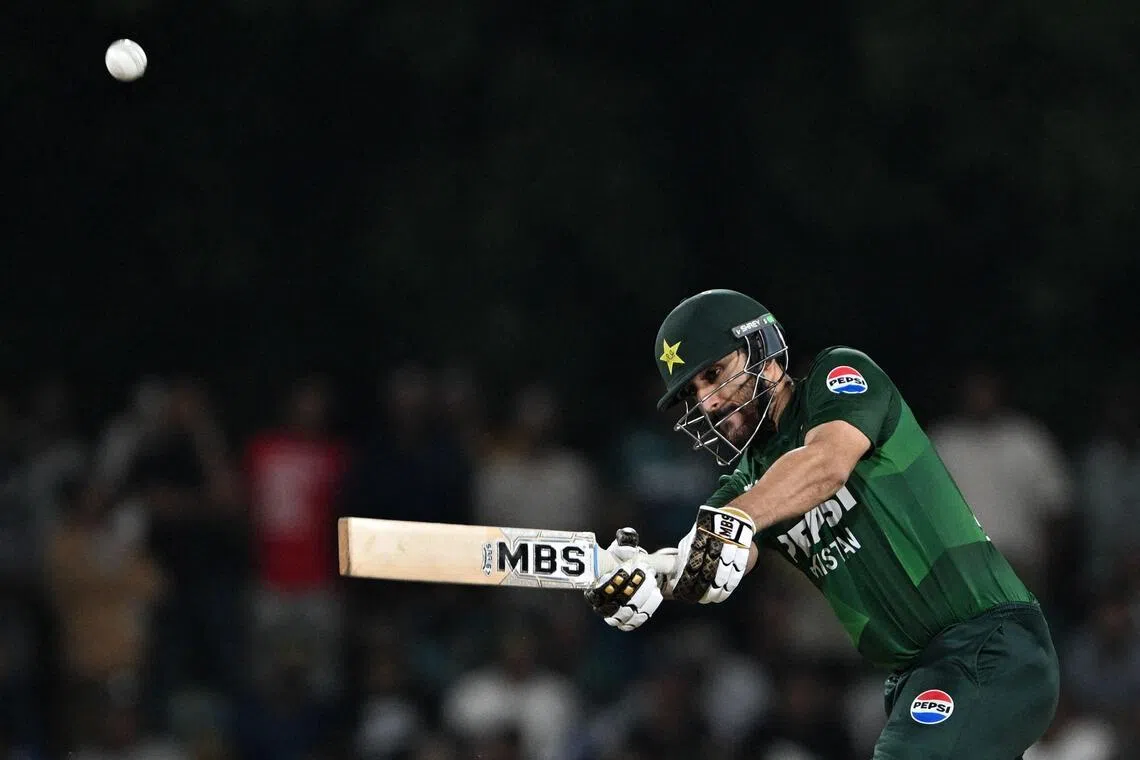Pakistan's captain Salman Agha plays a shot in the third and final Twenty20 international cricket match against Sri Lanka at the Rangiri Dambulla International Stadium in Dambulla on Jan 11, 2026.