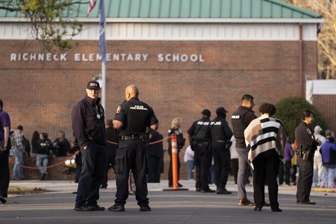 Police respond to a shooting that injured a teacher at Richneck Elementary in Newport News, Virginia, on Jan 6, 2023.