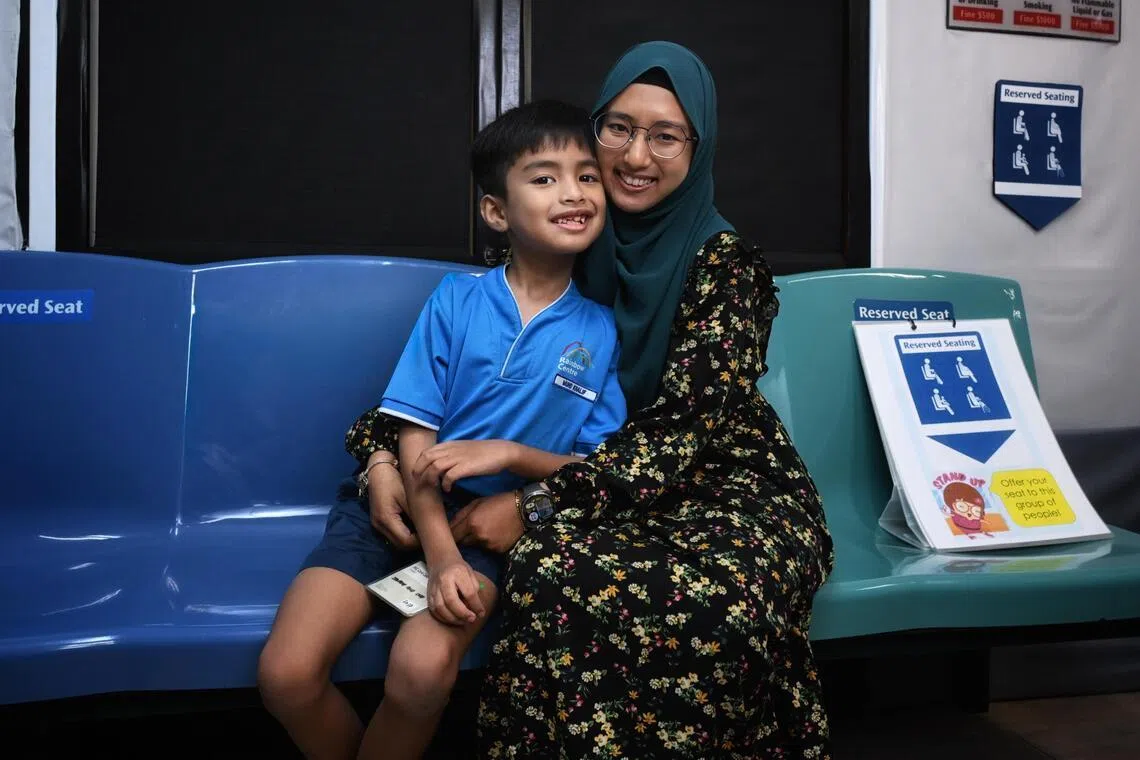 Muhammad Khalif Muhammad Khair Abdillah, 8, a student in the Junior Programme in Rainbow Centre Yishun Park School, and his mother, Nurhidayah Salleh, 33, on April 8, 2026.