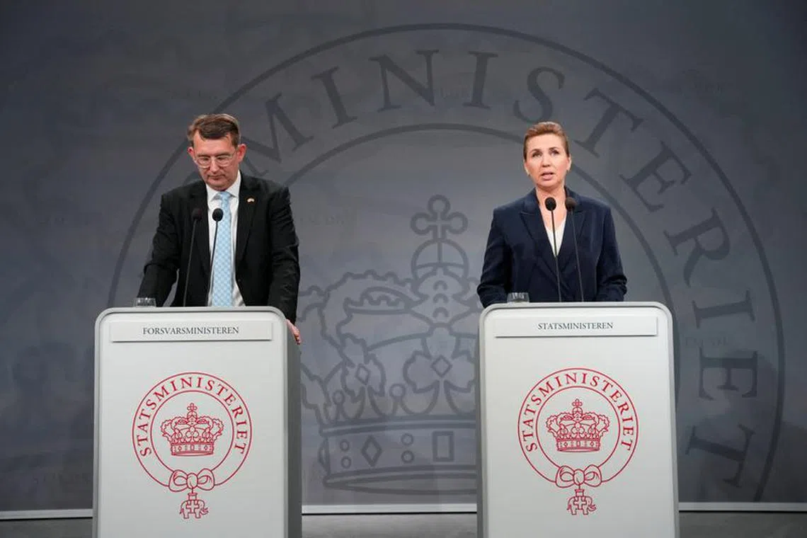 Denmark's Prime Minister Mette Frederiksen and Deputy Prime Minister and Minister of Defense Troels Lund Poulsen hold a press conference on defense cooperation with the United States, in the Hall of Mirrors in the State Ministry in Copenhagen, Denmark, December 19, 2023. Ritzau Scanpix/Emil Helms via REUTERS