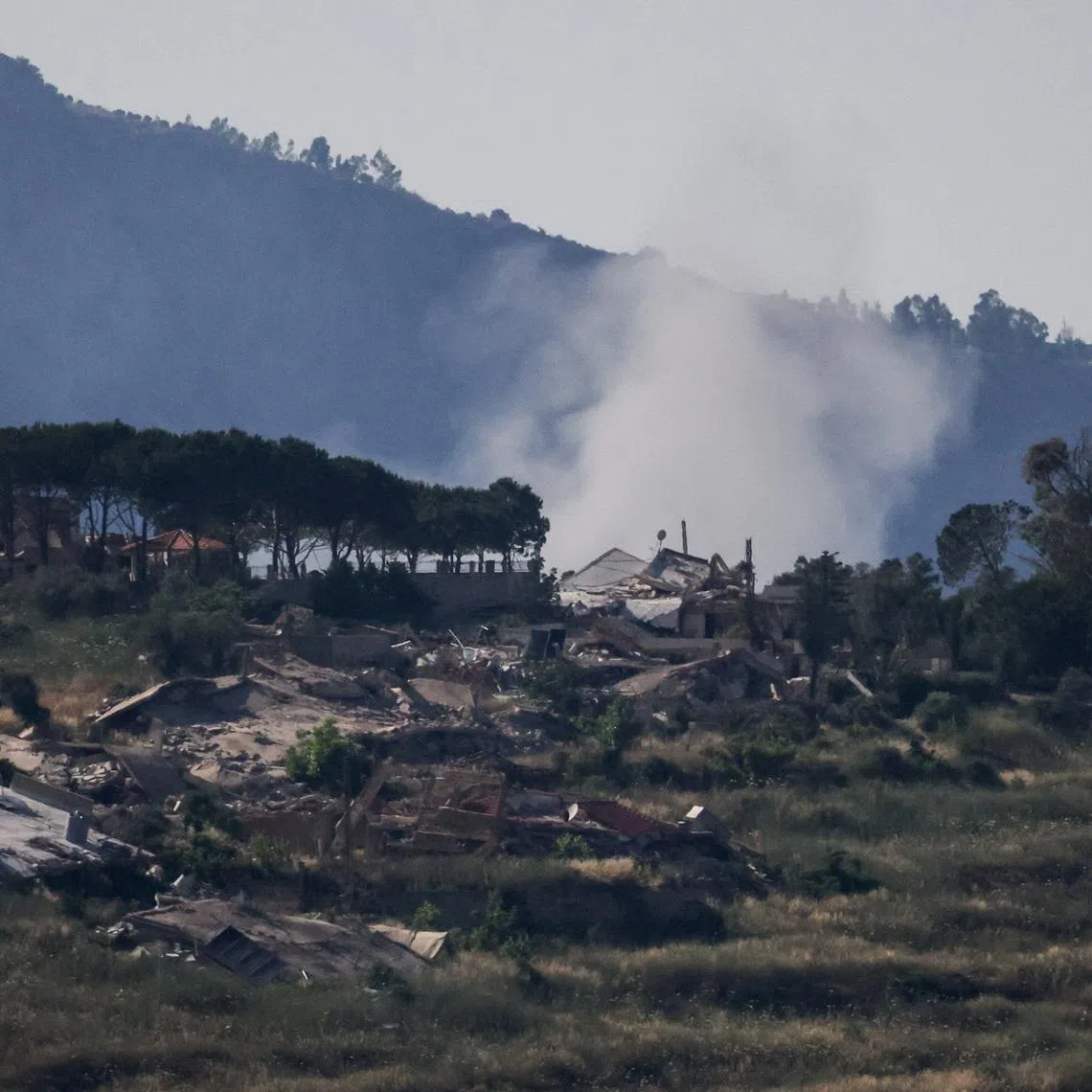 Smoke rises in southern Lebanon following an explosion, as seen from the Israeli side of the Israel-Lebanon border, in northern Israel, June 10, 2026. REUTERS/Ammar Awad