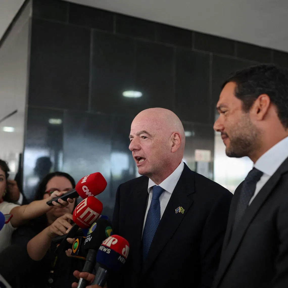 FIFA President Gianni Infantino talks to journalists after a meeting with Brazilian President Luiz Inacio Lula da Silva at the Planalto Palace in Brasilia, Brazil January 26, 2026. REUTERS/Mateus Bonomi