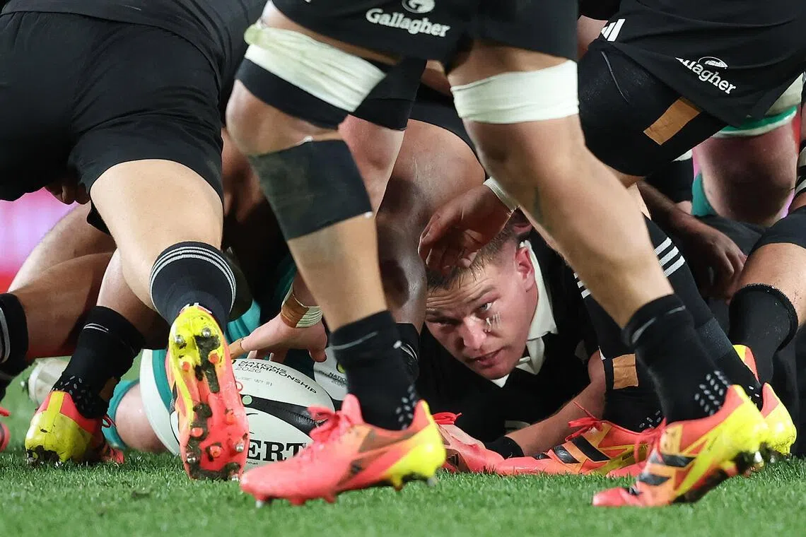 Ethan de Groot of New Zealand places the ball at the back of a ruck during the rugby Nations Championship match between New Zealand and Ireland at Eden Park in Auckland on July 18, 2026. (Photo by Michael Bradley / AFP)