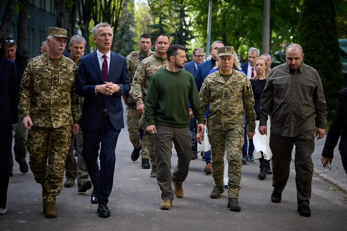 Nato Secretary-General Jens Stoltenberg (left) and Ukraine's President Volodymyr Zelensky (centre) are pictured in Kyiv, in April 2024.
