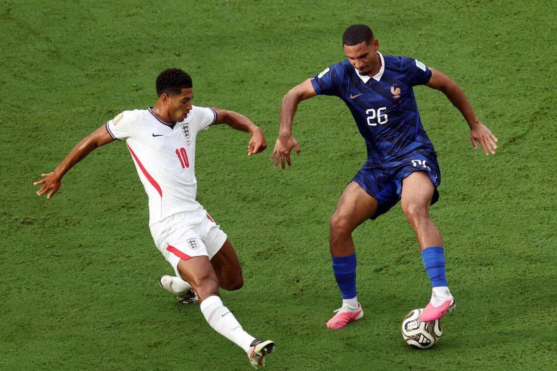 France defender Maxence Lacroix shielding the ball from England midfielder Jude Bellingham in the World Cup third-place play-off in Miami on July 18. England won 6-4.