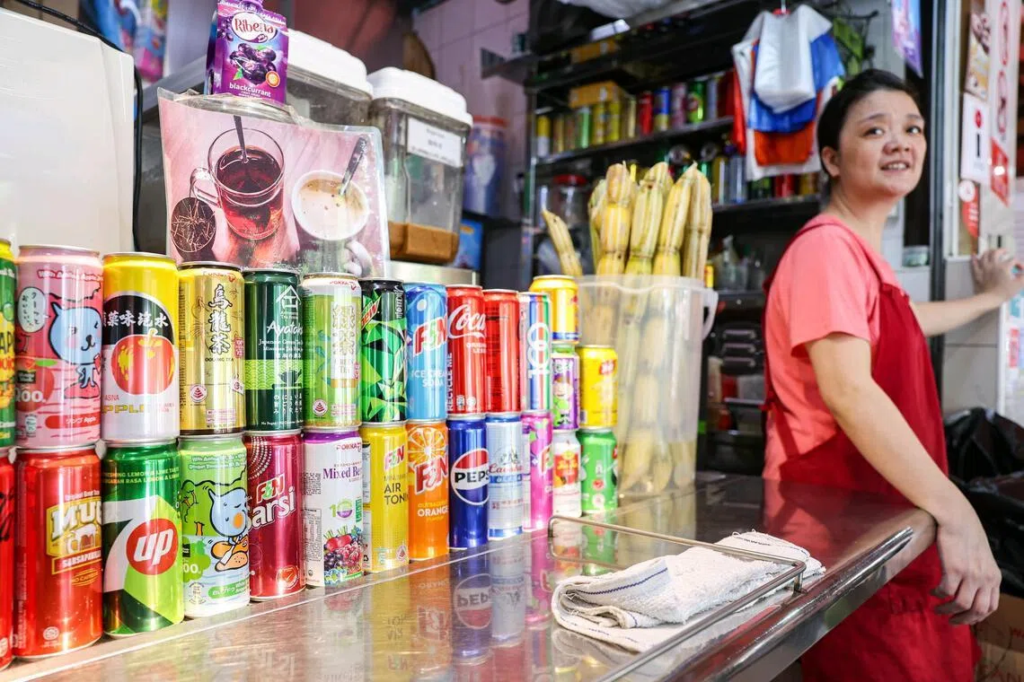 Ms Weng Xiuying, owner of the Shui Zhi Yuan drink stall at Sembawang Hills Food Centre, said she has not received any beverages bearing the 10 cent return logo.