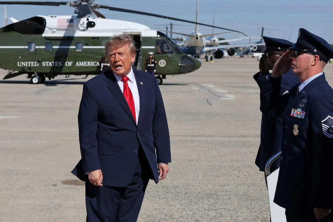 US President Donald Trump speaking to reporters before boarding Air Force One on Oct 23.