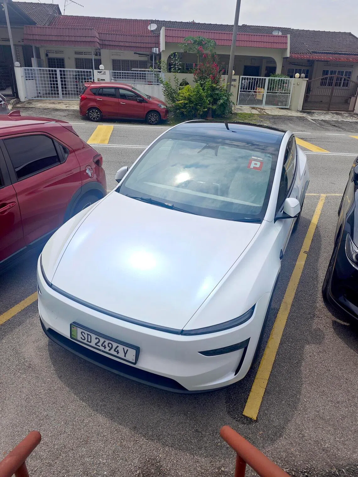 The couple also bought a Tesla Model 7 for $70,000 and charge the electric vehicle at home.