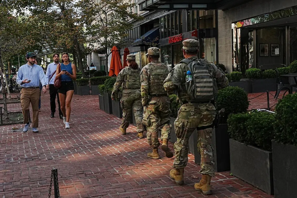 Members of the National Guard patrol near Dupont Circle weeks after U.S. President Donald Trump deployed the National Guard and ordered an increased presence of federal law enforcement in Washington, D.C., U.S., September 2, 2025. REUTERS/Leah Millis