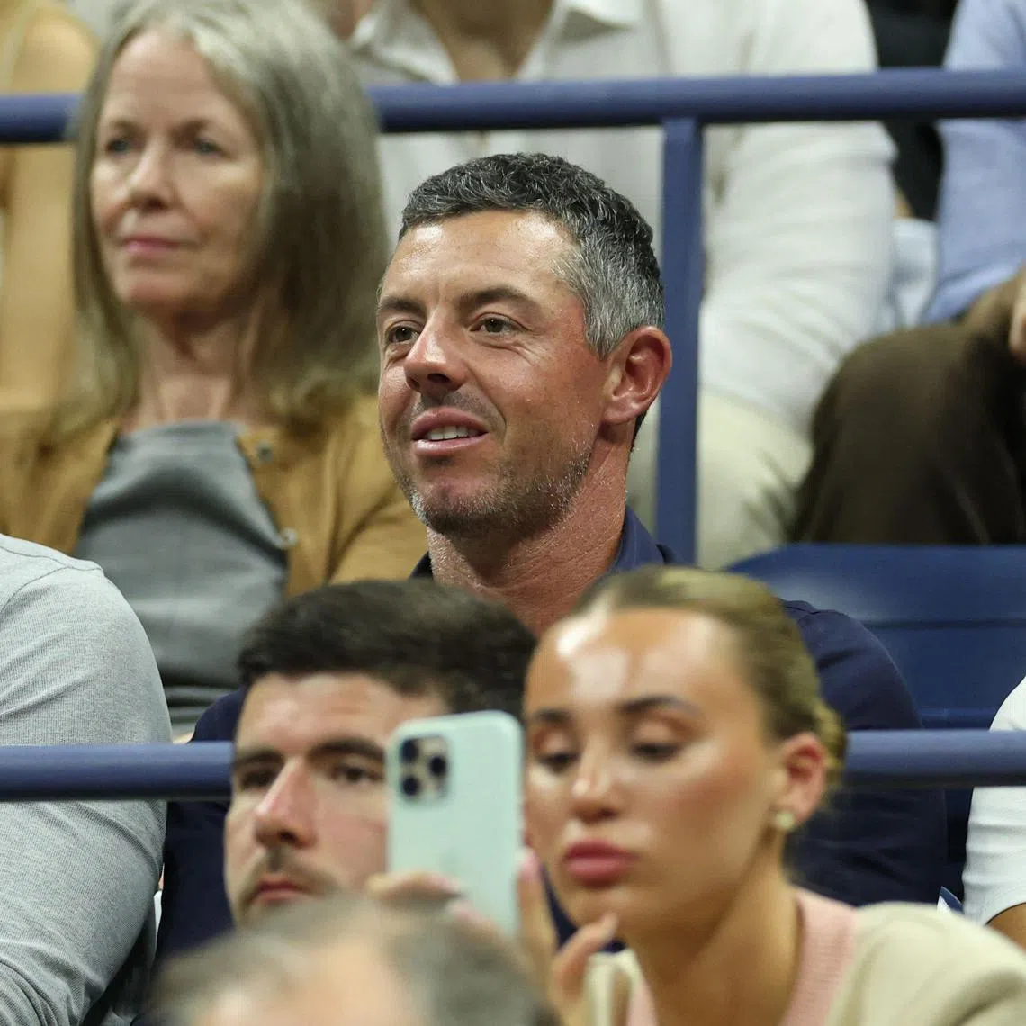 Northern Irish golfer Rory McIlroy, seen here at tennis' US Open, has taken advice from Roger Federer as he reaches the tail end of his career.