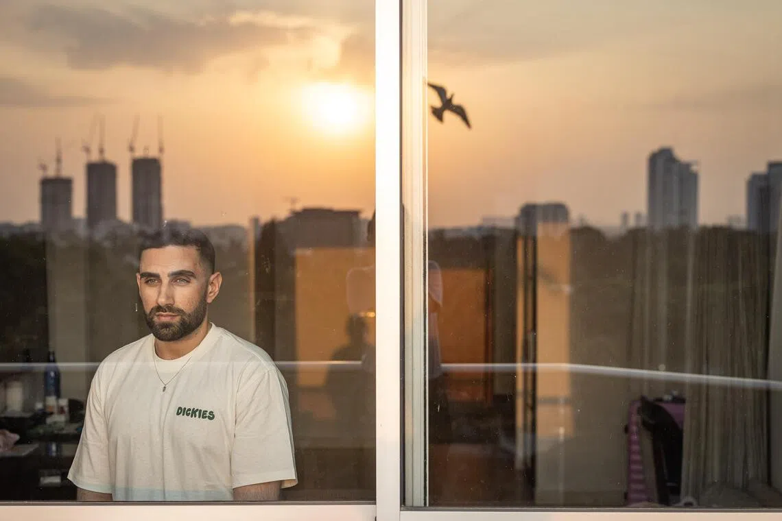 Segev Kalfon, who, like other hostages, described enduring numerous physical abuses, food deprivation and mind games during his 738 days as a captive of Hamas, at a rehabilitation center in Ramat Gan, Israel, Nov. 4, 2025. While he knows that many in Israel hoped for his return, he is angry that the Israeli government took two years to secure his freedom. (Avishag Shaar-Yashuv/The New York Times)