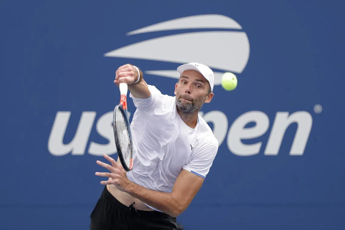 FILE PHOTO: Aug 30, 2021; Flushing, NY, USA; Ivo Karlovic of (CRO) serves against Andrey Rublev (RUS)(not pictured) on day one of the 2021 U.S. Open tennis tournament at USTA Billie King National Tennis Center. Mandatory Credit: Geoff Burke-USA TODAY Sports/File Photo