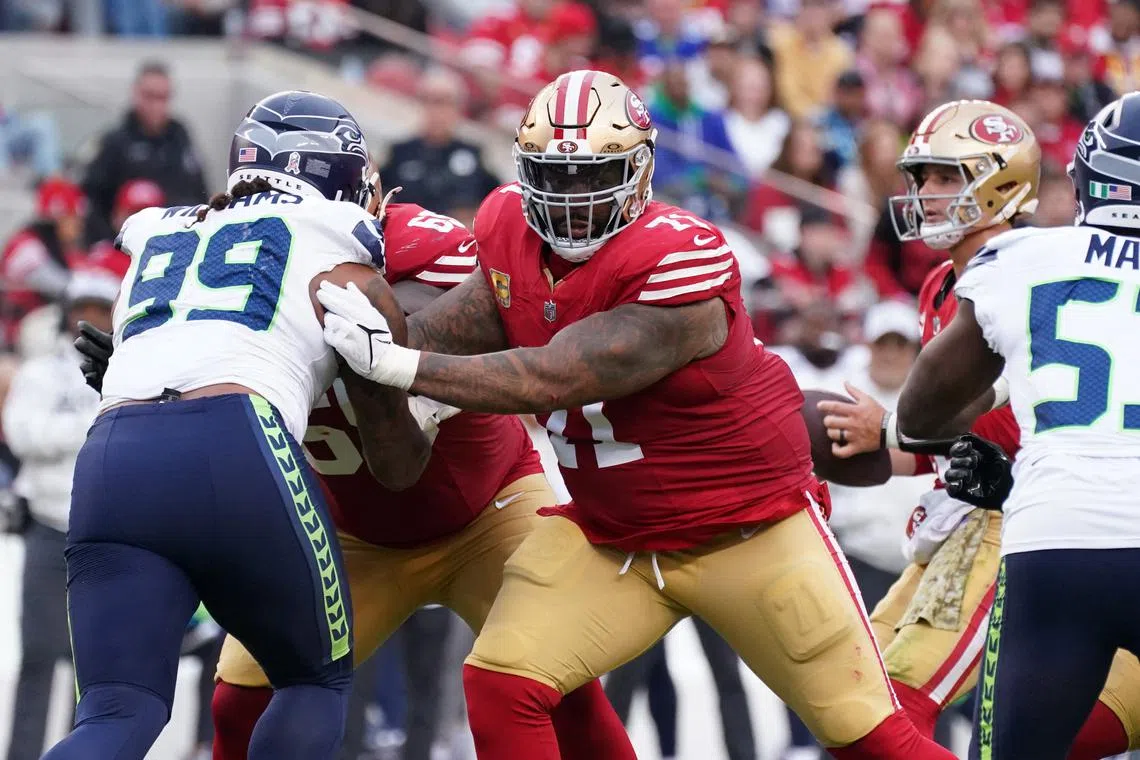 Nov 17, 2024; Santa Clara, California, USA; San Francisco 49ers offensive tackle Trent Williams (71) blocks Seattle Seahawks defensive end Leonard Williams (99) in the third quarter at Levi's Stadium. David Gonzales-Imagn Images/File Photo