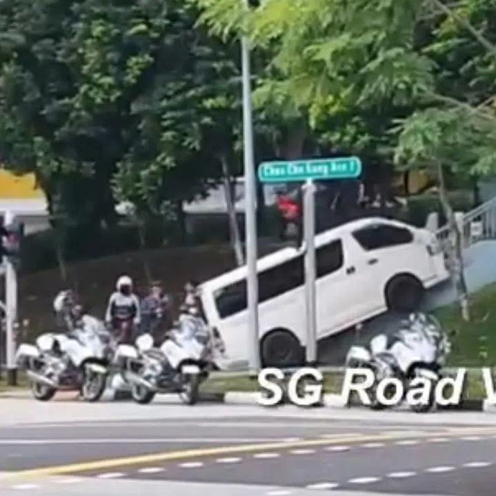 The chase ends with the van having driven onto the pavement and onto a staircase.