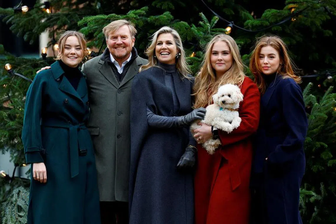FILE PHOTO: Dutch King Willem-Alexander and Queen Maxima pose with their children, Crown Princess Amalia, Princesses Alexia, Ariane and dog Mambo during an official photo session in The Hague, Netherlands December 22, 2023. REUTERS/Piroschka van de Wouw/File Photo