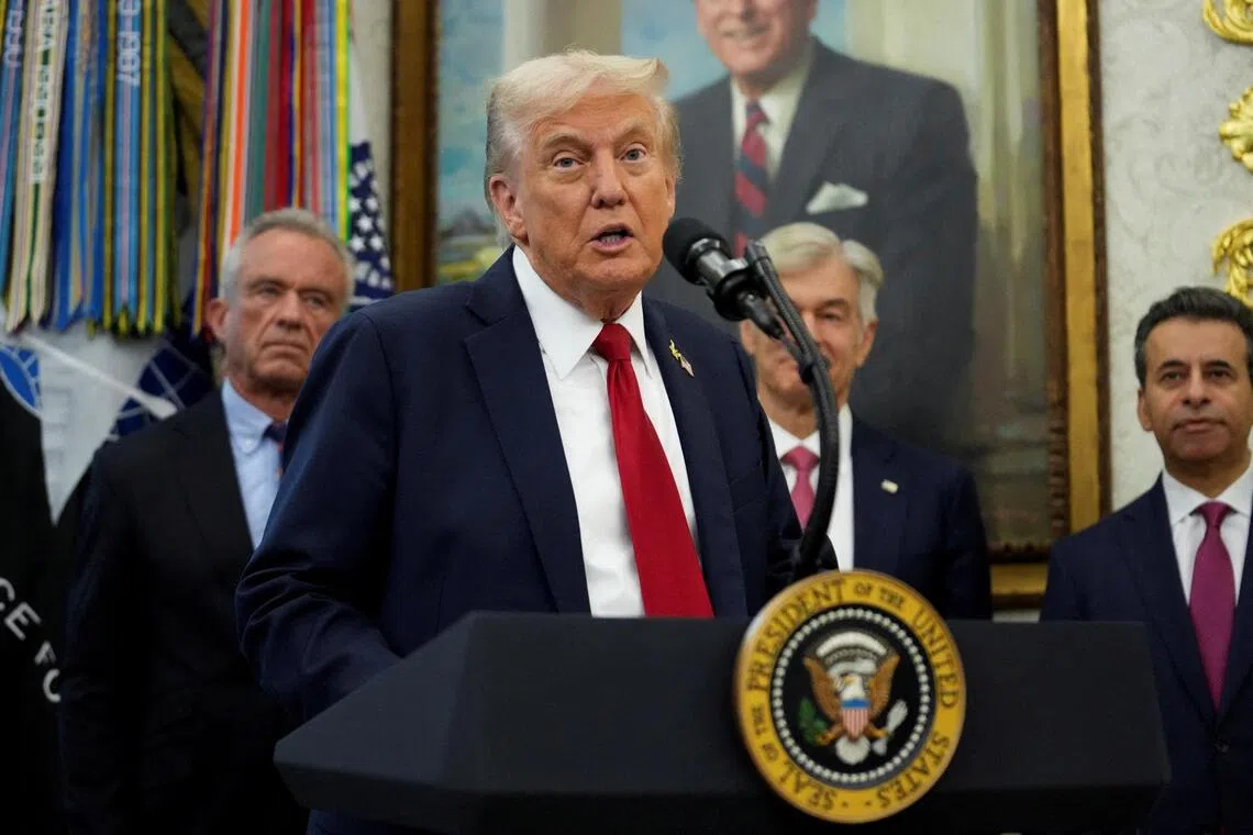 US President Donald Trump has pledged to treat an armed attack on Qatar as a threat to the US' own security.
