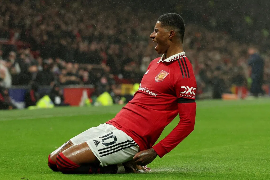 Manchester United's Marcus Rashford celebrates scoring their first goal.