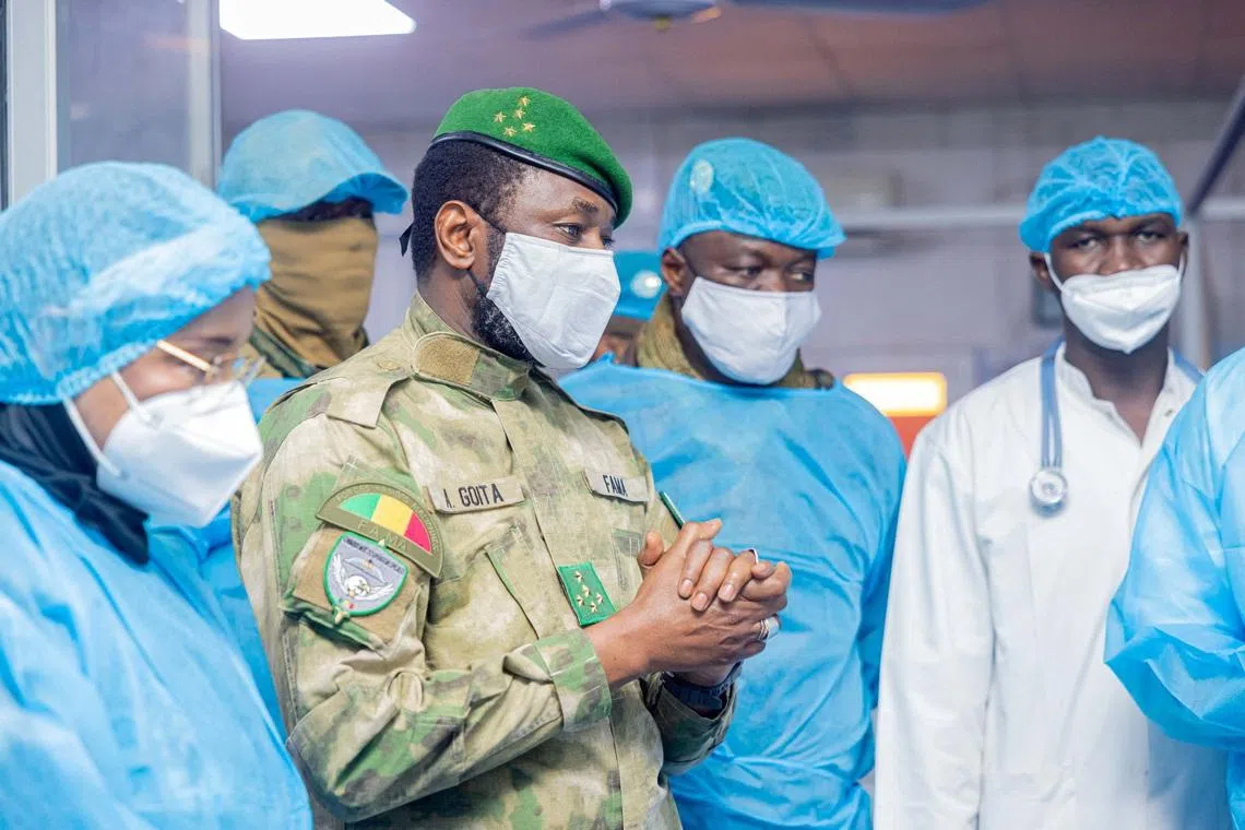 The leader of Mali's military government, Assimi Goita, visits wounded civilians and military personnel in Bamako, Mali, in this handout photo released on April 28, 2026. Mali Presidency via Facebook/Handout via REUTERS