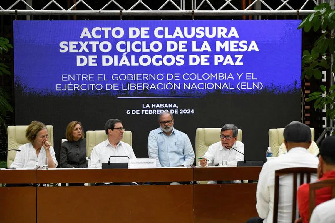 Representative of the National Liberation Army (ELN) Pablo Beltran speaks during the sixth round of peace dialogues between Colombia's government and the National Liberation Army, accompanied by Vera Grabe Loewenherz, Chief of Delegation of the Government of Colombia, Cuba’s Foreign Minister Bruno Rodriguez and Eugenio Martinez, General Director for Latin America and the Caribbean, at the Ministry of Foreign Affairs of Cuba, in La Habana, Cuba February 6, 2024. REUTERS/Norlys Perez/File Photo