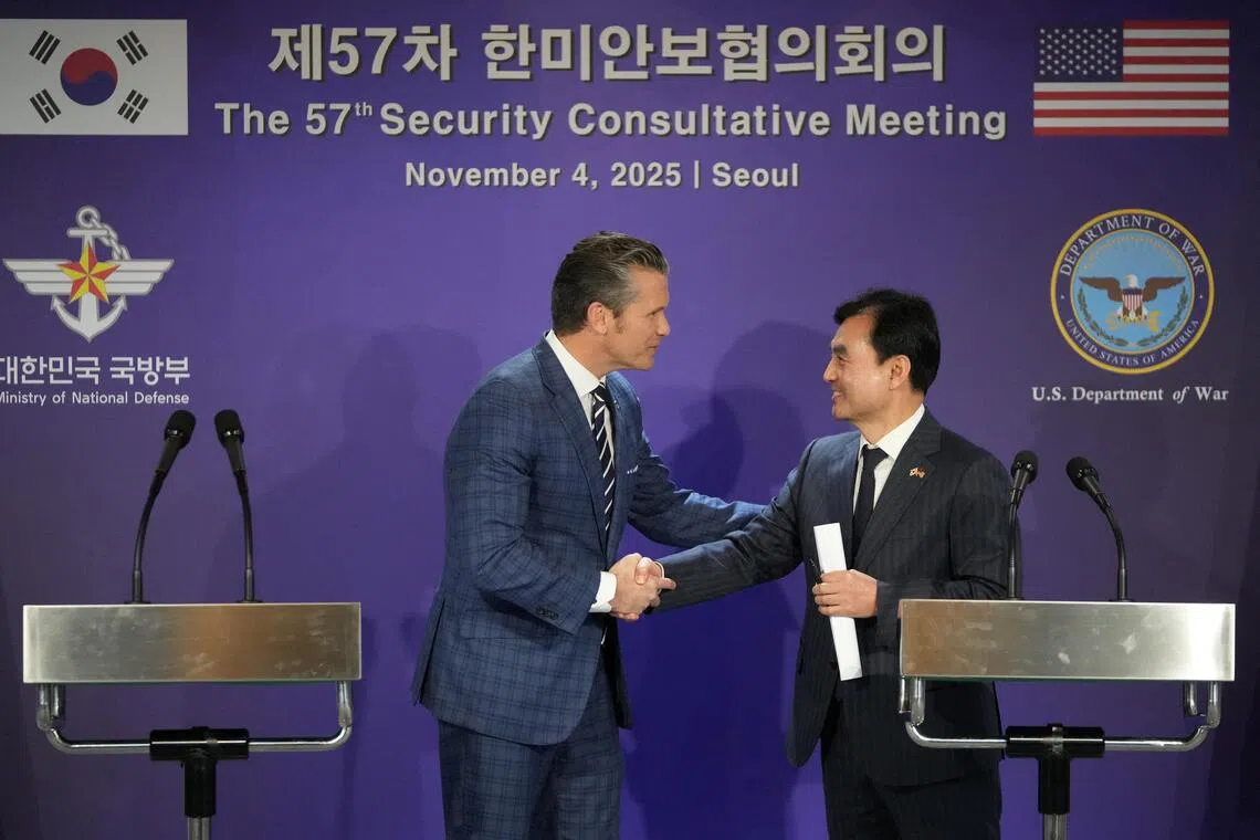 US Defence Secretary Pete Hegseth (left) and South Korean Defence Minister Ahn Gyu-Back, shake hands after the joint press conference in Seoul, South Korea on Nov 4, 2025.  