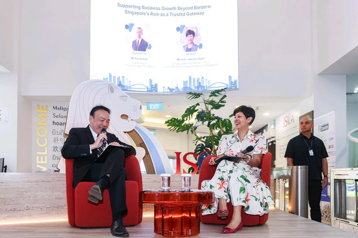 Second Minister for Finance and National Development Indranee Rajah at a fireside chat with Daniel Koh, vice-president of the Council of the Law Society of Singapore, during the launch of the Singapore Professional Services Centre.