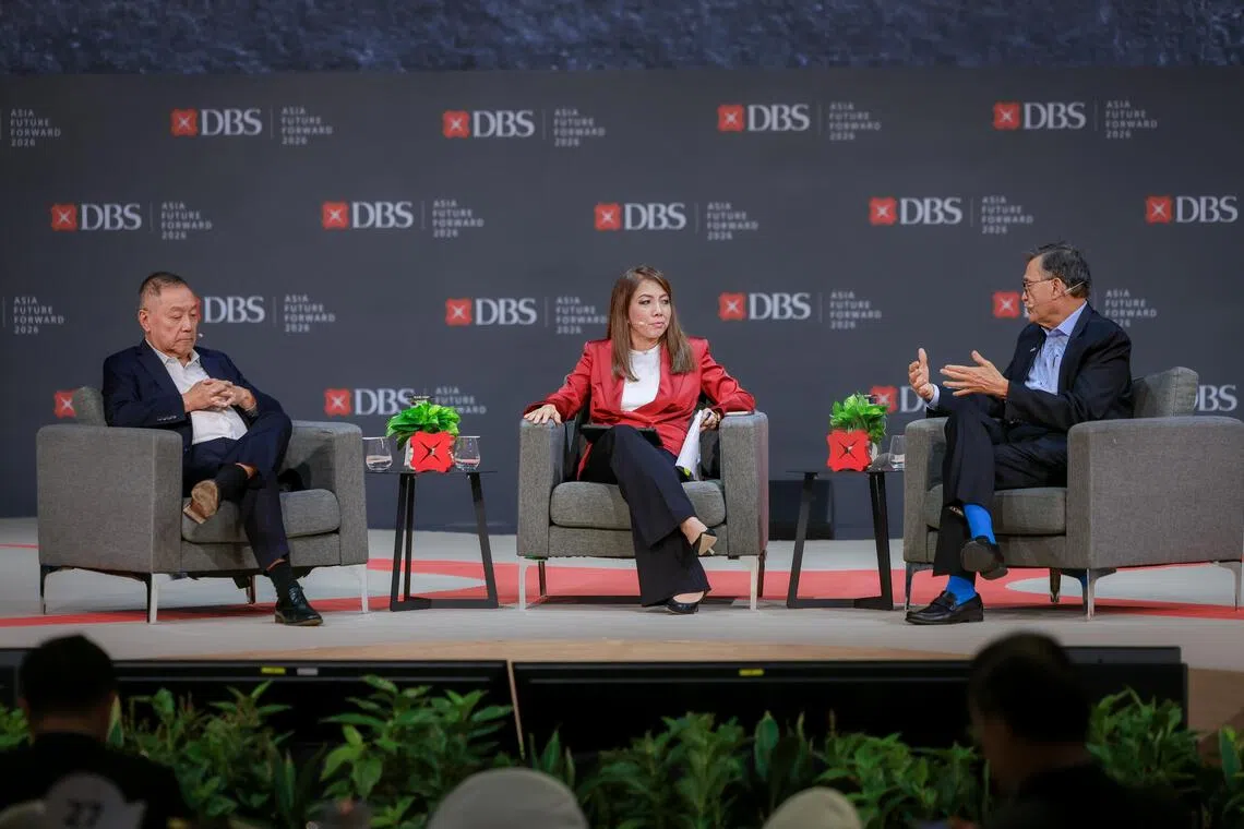 Intel CEO Lip-Bu Tan (right) and Broadcom president and CEO Hock Tan (left) participate in a panel discussion moderated by DBS Bank CEO Tan Su Shan during the DBS Asia Future Forward Conference at Suntec Convention and Exhibition Centre on Oct 12.