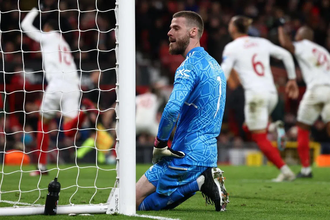 Manchester United goalkeeper David de Gea reacts after conceding a second goal against Sevilla.