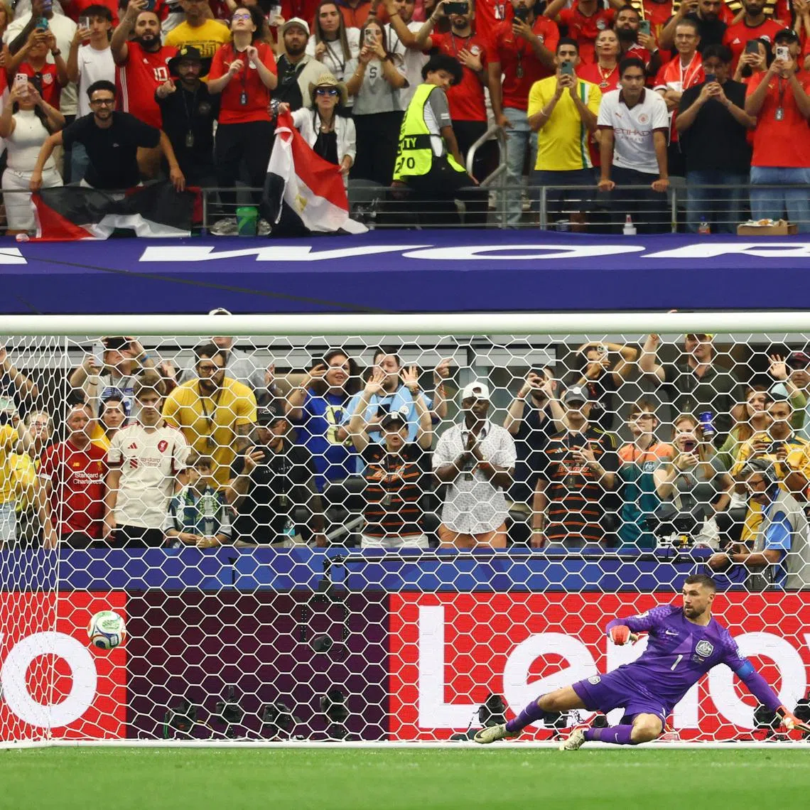 Soccer Football - FIFA World Cup 2026 - Round of 32 - Australia v Egypt - Dallas Stadium, Arlington, Texas, U.S. - July 3, 2026 Egypt's Hossam Abdelmaguid scores the penalty to win the shoot-out as Egypt qualify for the Round of 16 stage of the World Cup REUTERS/Kai Pfaffenbach