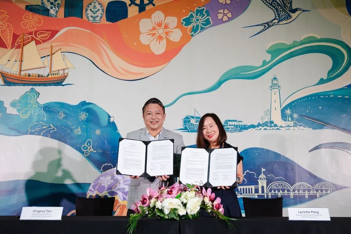 Gregory Tan (left), CEO of SATS-Creuers, and Lynette Pang, deputy CEO of NAC, signing the memorandum of understanding.