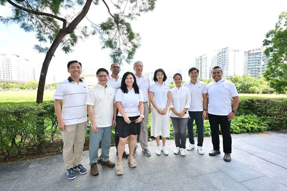 (From left) Mr Goh Pei Ming, Mr Foo Cexiang, Senior Minister Janil Putucheary, grassroot advisor Yeo Wan Ling, Senior Minister Teo Chee Hean, Minister Sun Xueling, Ms Valerie Lee, Senior Minister Desmond Tan and grassroot advisor Sharael Taha at Oasis Terraces on April 6.