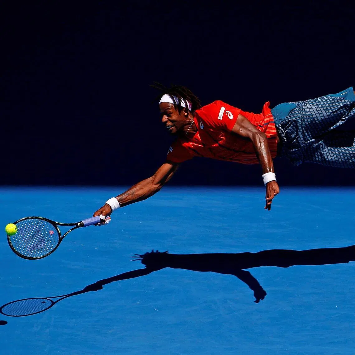 Fantastic flight: France's Gael Monfils takes off in search of the ball during the 2016 Australian Open. 