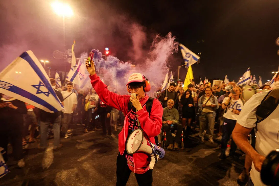 Anti-government protesters launch a prolonged demonstration calling for Israeli Prime Minister, Benjamin Netanyahu's government to resign and a general election in the wake of the deadly October 7 attack on Israel by the Palestinian Islamist group Hamas and the ensuing war in Gaza, in front of the Knesset, the Israeli parliament, in Jerusalem, March 31, 2024. REUTERS/Ronen Zvulun