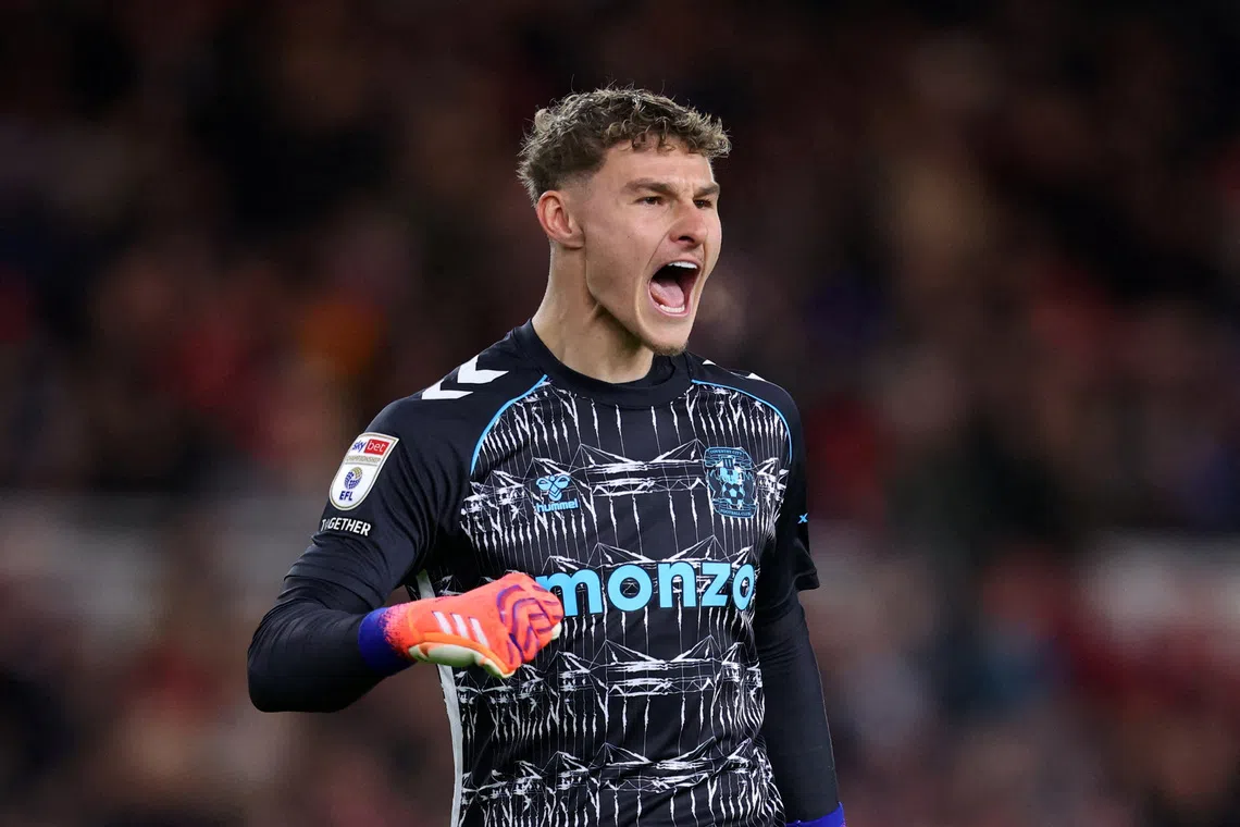 FILE PHOTO: Soccer Football - Championship - Middlesbrough v Coventry City - Riverside Stadium, Middlesbrough, Britain - November 25, 2025  Coventry City's Carl Rushworth celebrates their first goal scored by Victor Torp Action Images/Ed Sykes/File Photo